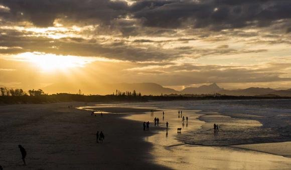 Quiet taxi rank at Athens airport at night with yellow taxis parked and waiting