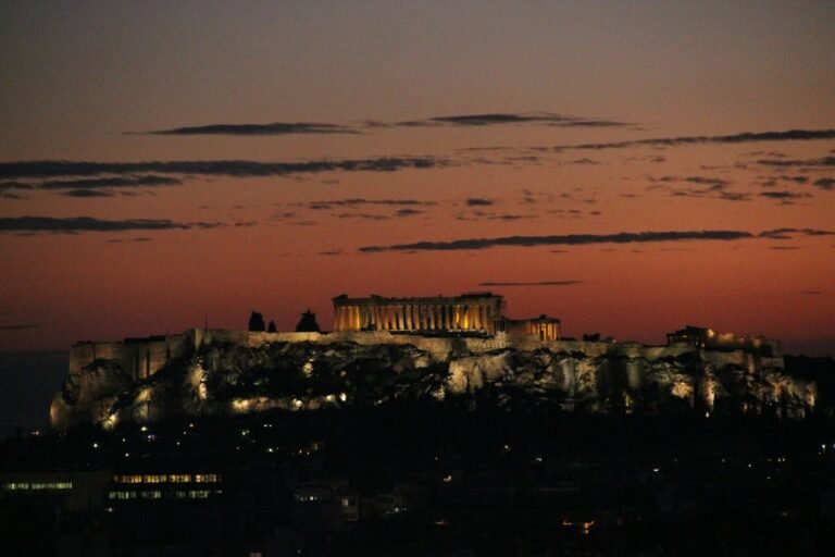 Athens airport transfer to Canopy by Hilton Athens — Acropolis glowing at sunset