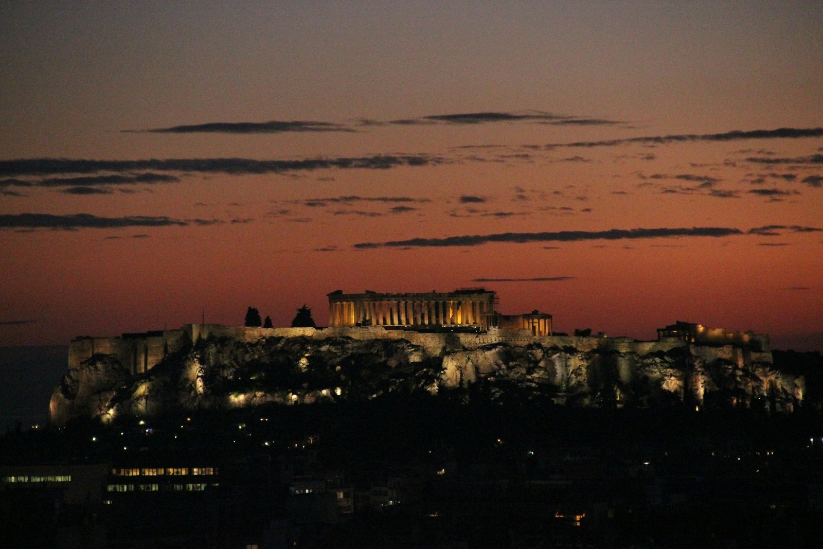 Athens airport transfer to Canopy by Hilton Athens — Acropolis glowing at sunset