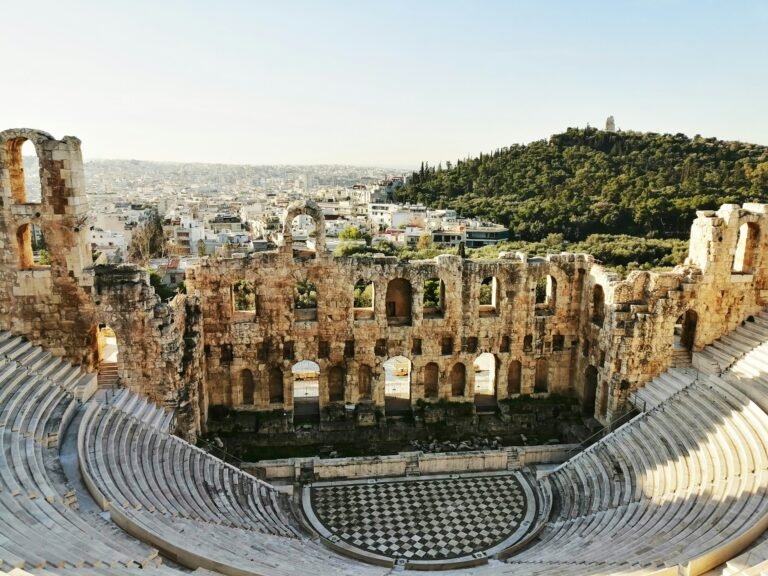 Athens airport transfer to Fresh Hotel Athens — aerial view of Odeon of Herodes Atticus below the Acropolis